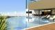 Raridade-Apartamento com 2 su&iacute;tes, living 27m&sup2;, infra de resort, 2 vagas